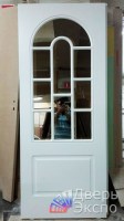 Белая дверь арочная классика
